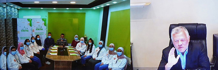 His Majesty King Abdullah greets the Robotna Girls team in a video call on Wednesday (Photo courtesy of Royal Court)